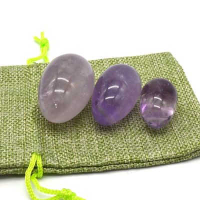 OEM acepta huevos de Yoni tallados para el ejercicio vaginal huevos de jade de amatista natural perforados