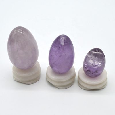 OEM acepta huevos de Yoni tallados para el ejercicio vaginal huevos de jade de amatista natural perforados