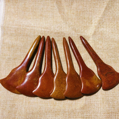 Experimenta los beneficios curativos del masaje de cuerpo completo y la estimulación de puntos de acupuntura con el tablero de Gua Sha de Piedra Roja Bian
