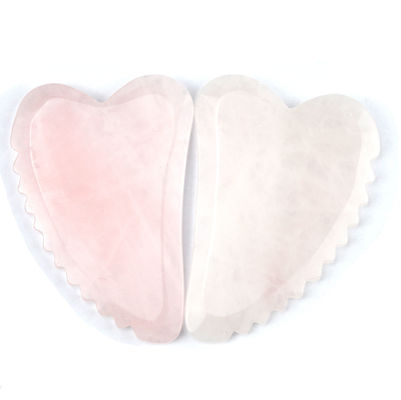 Tabla Gua Sha de forma personalizada de cuarzo rosa de mano La herramienta de masaje facial imprescindible
