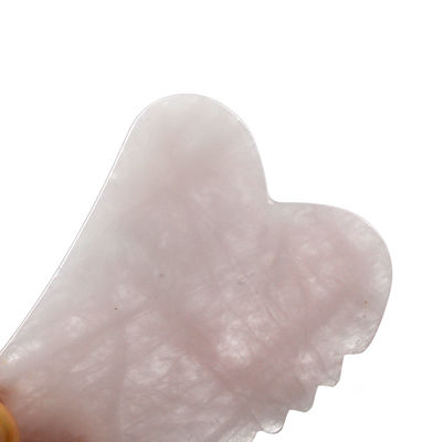 Tabla Gua Sha de forma personalizada de cuarzo rosa de mano La herramienta de masaje facial imprescindible