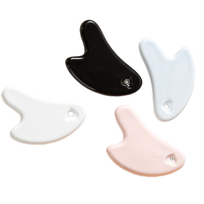 Cuerpo músculos forma de corazón tabla de raspado de cerámica Gua Sha para el cuerpo cómodo y la herramienta de masaje facial