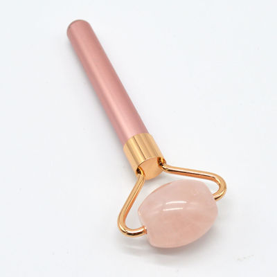 Roller de masaje facial natural de cuarzo rosa para una complexión renovada y revitalizada