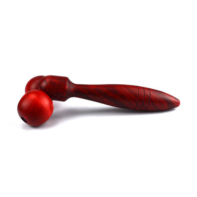 Roller de masaje de madera rojo o amarillo para la terapia facial y el tratamiento antiarrugas