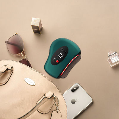 Terapia de compresión en caliente herramienta eléctrica Bian Stone Body Gua Sha con certificado ISO9001 y masajeador de vibración inteligente