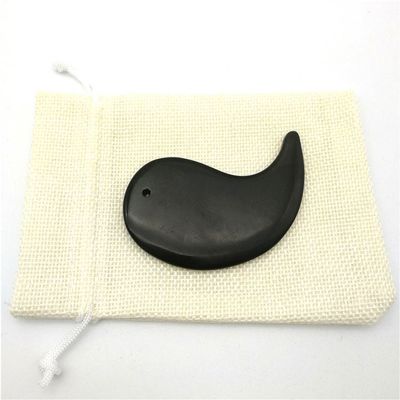 Revitaliza tu cuerpo con la herramienta de masaje de raspado de piedra negra Bian Gua Sha