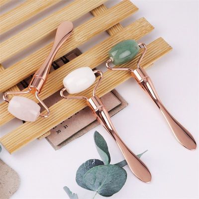 Logotipo personalizado DisponibleD Dispositivo de belleza de levantamiento facial de metal para el cuidado de la belleza y juego de rodillos de jade