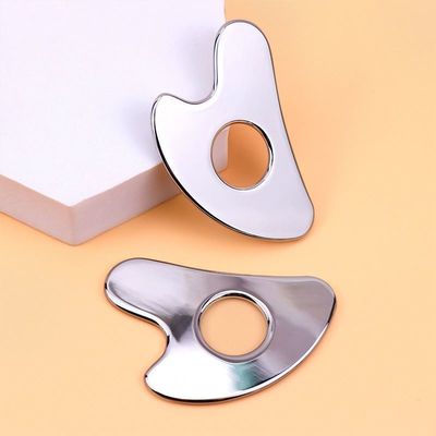 Acero inoxidable en forma de corazón Cuadro hueco Gua Sha Metal Herramienta de belleza facial para el área de masaje de cuerpo completo y OEM / ODM
