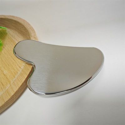 Logotipo personalizado Herramienta de cuidado de la piel de acero inoxidable Tabla Gua Sha en forma de corazón para levantamiento facial Masajista de metal