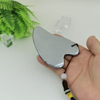 Terahertz Stone Gua Sha Herramienta de masaje facial 2024 Logotipo personalizado portátil para equipo de masaje corporal en forma de corazón