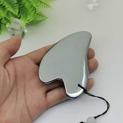 Terahertz Stone Gua Sha Herramienta de masaje facial 2024 Logotipo personalizado portátil para equipo de masaje corporal en forma de corazón