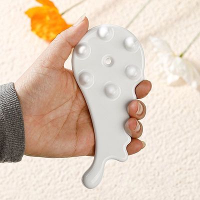 Experimenta el poder curativo del peine de cerámica Gua Sha para masajes faciales y corporales