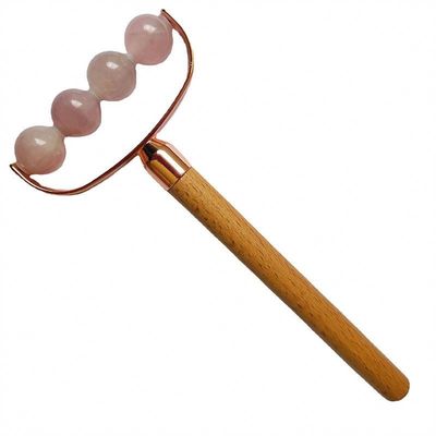 Masajeador facial portátil de cuarzo rosa de cabeza única Facial antiarrugas rodillo mango de madera