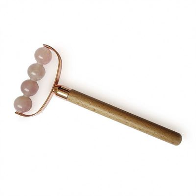 Masajeador facial portátil de cuarzo rosa de cabeza única Facial antiarrugas rodillo mango de madera