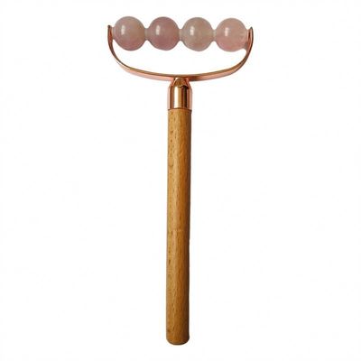 Masajeador facial portátil de cuarzo rosa de cabeza única Facial antiarrugas rodillo mango de madera