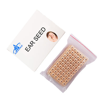 Agujas de acupuntura Masaje funcional 600 piezas/caja Semillas de prensa de oído desechables Kit de acupresión de semillas de oído multi-condición