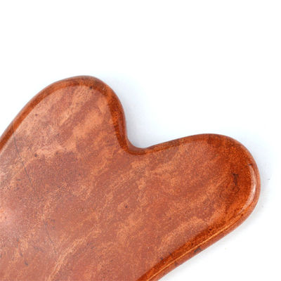 Masaje corporal Herramienta Guasha de jaspe rojo piedra de jade raspador facial para el cuidado de la piel Logotipo personalizado Forma de corazón Herramienta masajista de cara Gua Sha