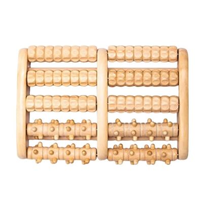 Roller de masajeador de pies de madera para aliviar el estrés personal y relajarse en madera marrón