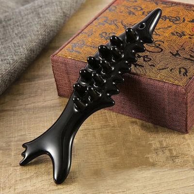 Masajeador de cerámica Guasha en forma de pez OEM / ODM Aceptado para la relajación muscular de los ojos y el cuello y la reducción de arrugas