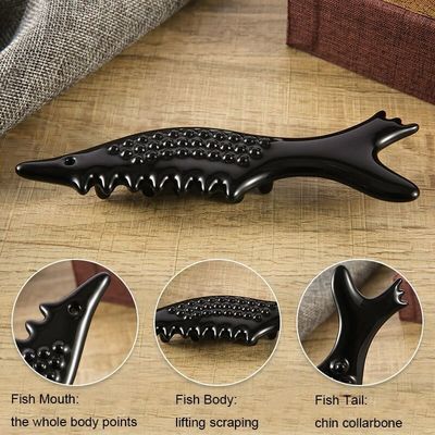 Masajeador de cerámica Guasha en forma de pez OEM / ODM Aceptado para la relajación muscular de los ojos y el cuello y la reducción de arrugas