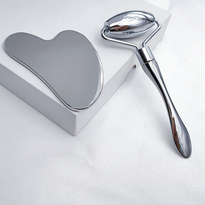 Equipo de masaje Logotipo personalizado disponibleD plata antienvejecimiento 304 de acero inoxidable de metal Gua Sha Facial Roller Eye Cream Stick