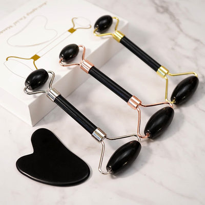 Escarabajo corporal Logotipo personalizado disponibleRoller de masaje facial de piedra blanca negra natural Guasha Set de rodillos de jade negro para masaje