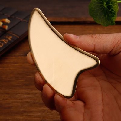 Forma de corazón de oro de latón natural Gua Sha metal raspado Guasha masajeador facial para el masaje de acupuntura meridiana