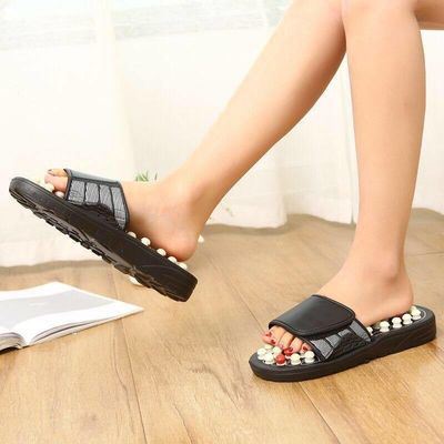 Herramientas de masaje Logotipo personalizado disponible Atención médica Acupuntura Zapatillas de pie Masajista Zapatos con adoquines naturales