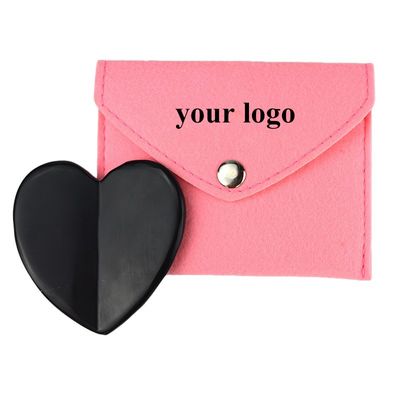 2024 Forma de corazón Natural Negro Piedra Bian Gua Sha Raspado Herramienta de masaje para el drenaje linfático Función de masaje muscular