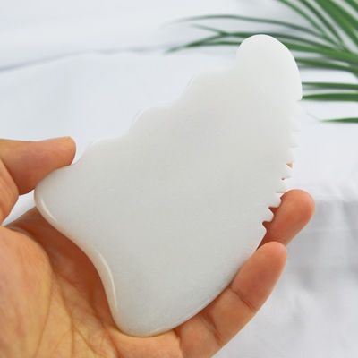 Logotipo personalizado disponible en el masaje facial de piedra Gua Sha de jade blanco para el tratamiento antienvejecimiento
