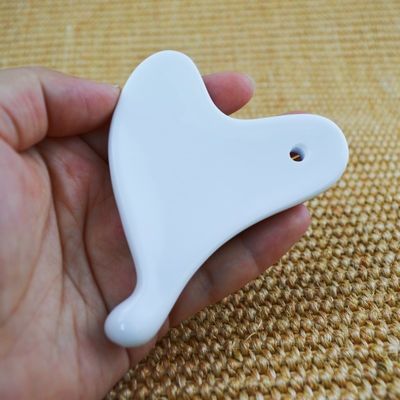 Tabla de cerámica Gua Sha para relajar los músculos en todo el cuerpo estilo médico cuidado personal