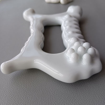 Herramienta de masaje de cerámica Gua Sha Popular Masajeador facial para el cuidado de la piel y el cuerpo antienvejecimiento