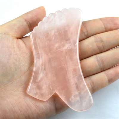 Masajista facial 2024 Piedra de Gua Sha de cuarzo rosa para el cuidado de la piel y el masaje corporal