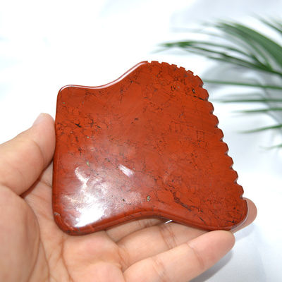 Propiedades del masajista Jaspe rojo natural Gua Sha Herramienta para masaje facial