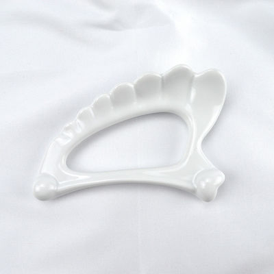 Herramientas de masaje 2024 forma de ala cerámica Gua Sha Masajista de mano para masajeador de cuerpo drenaje linfático y herramienta antienvejecimiento