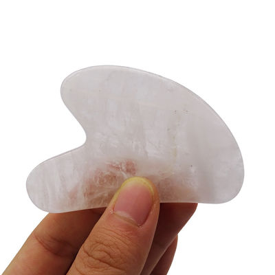 Masaje facial Forma de corazón Piedra Gua Sha de cristal blanco para terapia de acupuntura SPA en el Centro de Medicina Tradicional China