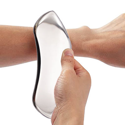 Masajeador facial herramienta de raspado de acero inoxidable portátil Gua Sha para el tratamiento SPA