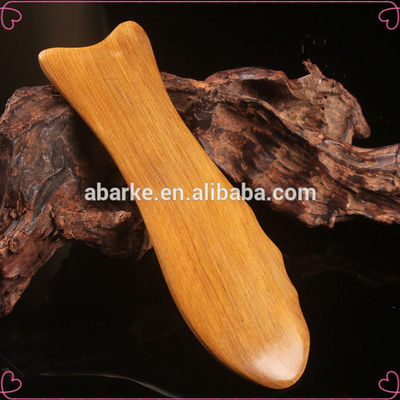 Tabla de Gua Sha de madera amarilla para la medicina tradicional china
