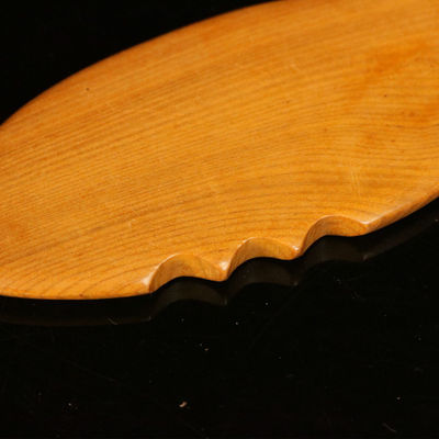 Tabla de Gua Sha de madera amarilla para la medicina tradicional china