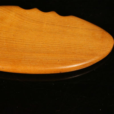 Tabla de Gua Sha de madera amarilla para la medicina tradicional china