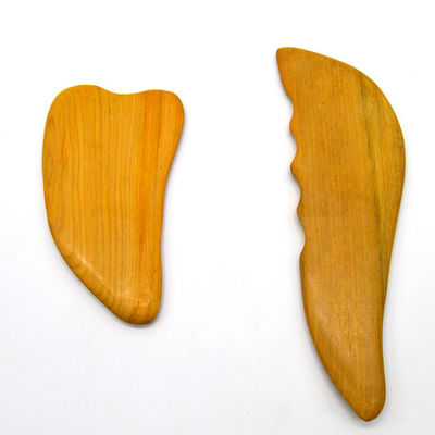 Herramientas de Gua Sha de madera natural de alcanfor para masajes faciales y corporales de diseño en forma de S