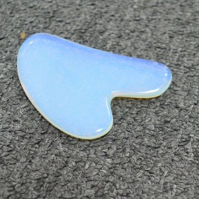 Técnico de piedra ópalo pulida Gua Sha raspado masajista para el cuidado de la piel y la desintoxicación