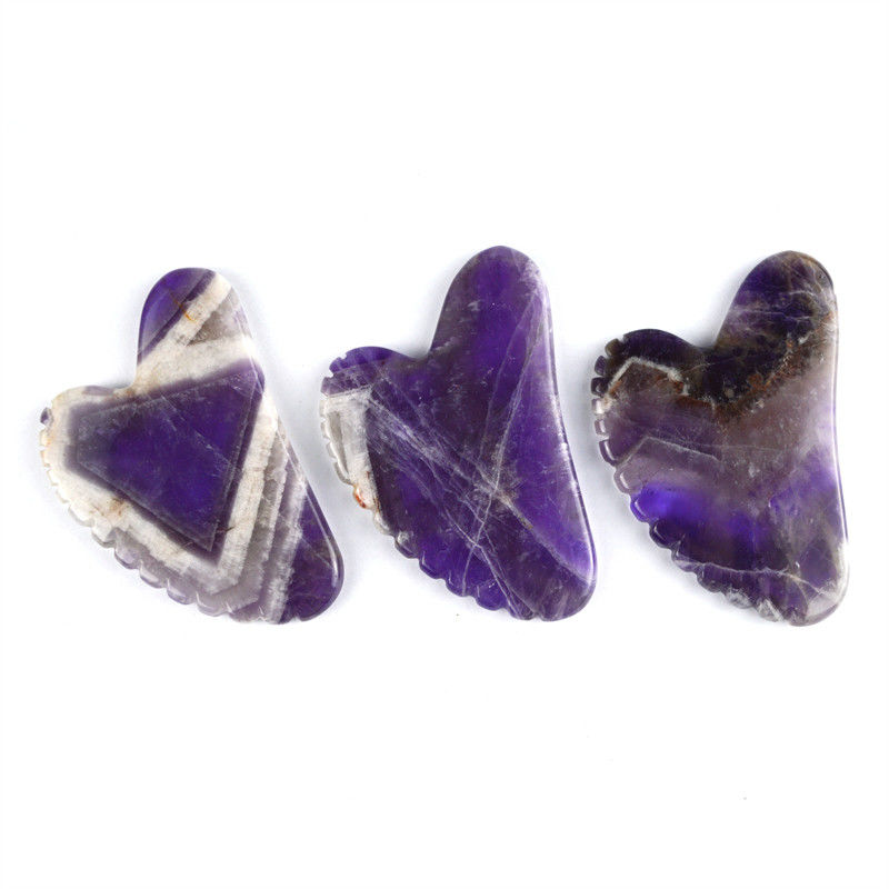 2024 Herramientas de masaje de moda Forma de corazón Ametista natural Gua Sha con dientes Logotipo personalizado Guasha Cuidado de la piel corporal