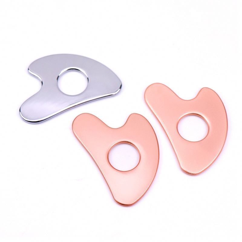 Acero inoxidable en forma de corazón Cuadro hueco Gua Sha Metal Herramienta de belleza facial para el área de masaje de cuerpo completo y OEM / ODM