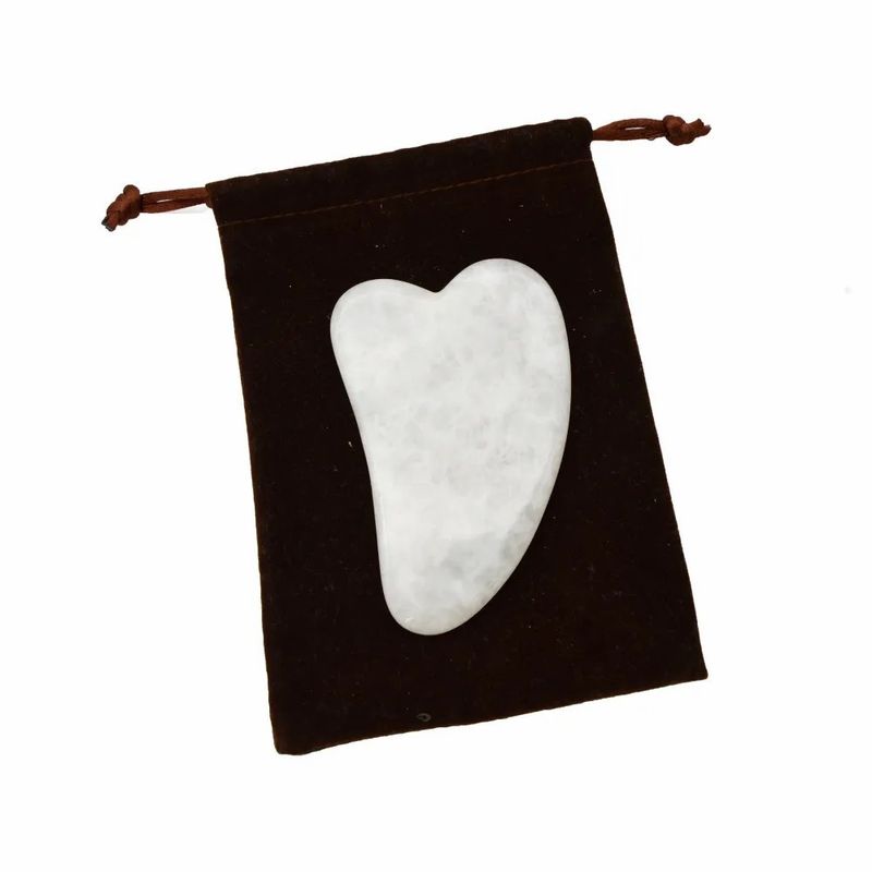 Herramienta portátil de Gua Sha hecha de jade blanco para un masaje muscular y cuidado de la belleza eficaces