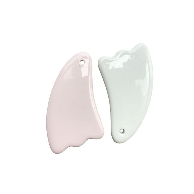 Diseño 2024 Multifunción Cerámica única Guasha raspado Facial Cuerpo Gua Sha Masajista para el rejuvenecimiento de la cara y el cuerpo
