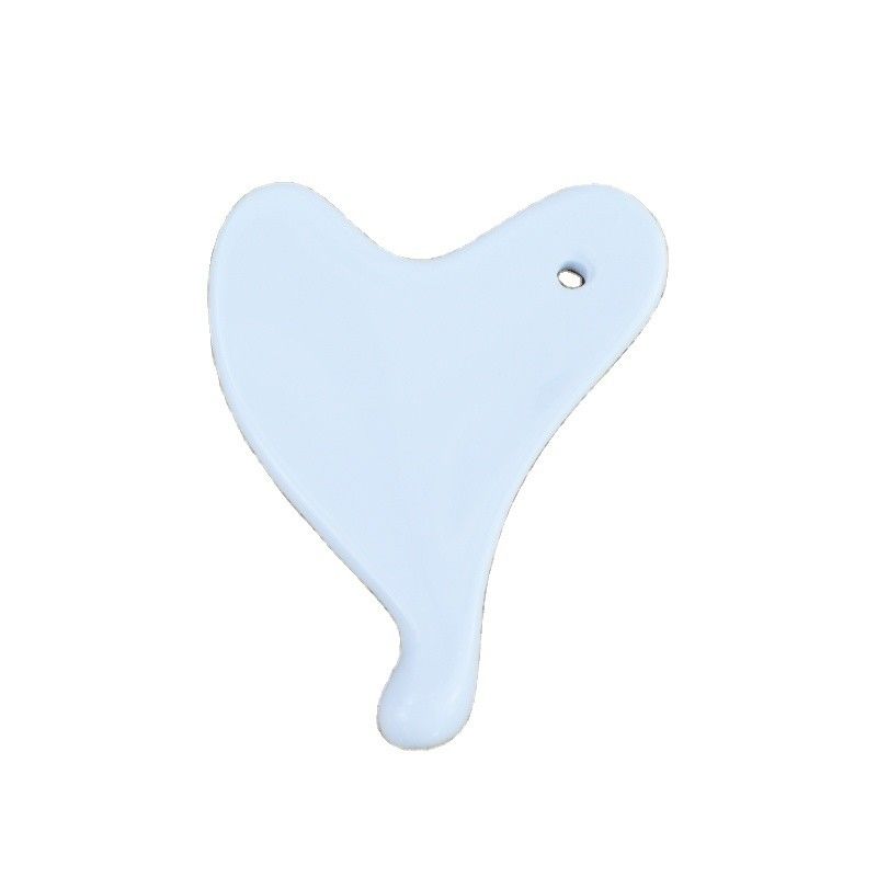 2024 Forma de corazón Mini Cerámica Gua Sha Herramienta de masaje para el levantamiento facial y la reducción de arrugas Logotipo personalizado disponible